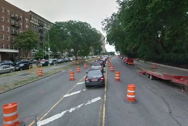 Eastbound traffic on Eastern Parkway. This photo pre-dates the bike lane that exists between the westbound lane and the service road from Washington to Grand Army Plaza